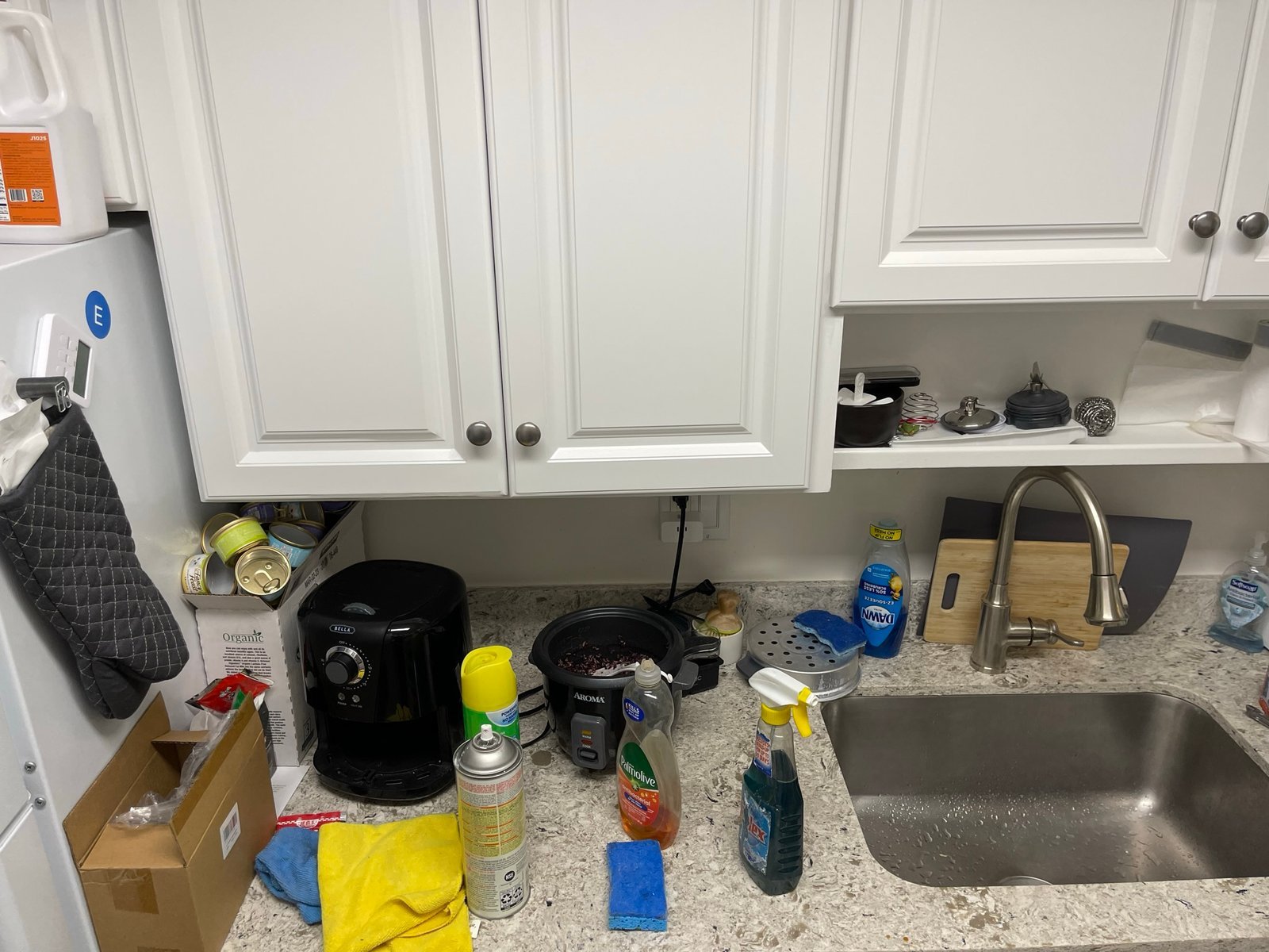 Kitchen stove cleaning in progress